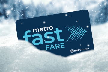 Metro Fast Fare card resting in the snow.